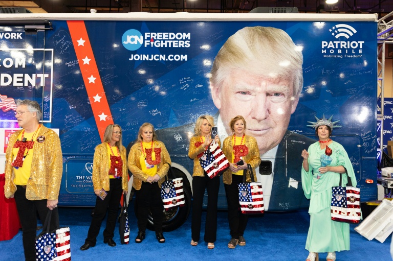 Photo for story: Attendees wear shirts spelling out “TRUMP” during the Conservative Political Action Conference at the Gaylord Texan Resort & Convention Center, in Grapevine, Texas