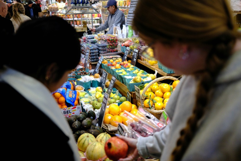 Photo for story: US retail sales fell unexpectedly in July with pullbacks at gasoline stations, online shops and grocery stores, government estimates show