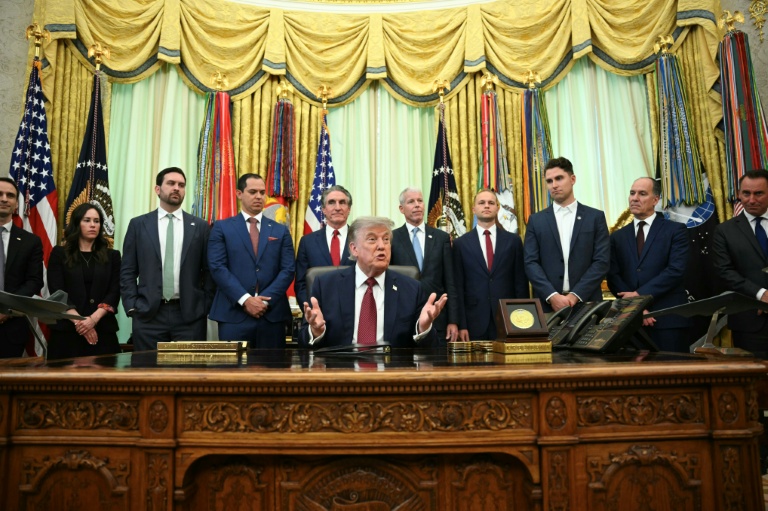 Photo for story: US President Donald Trump answered questions on Iran in the Oval office